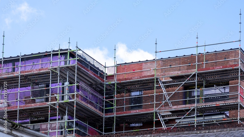 Scaffolding set up on renovated buildings