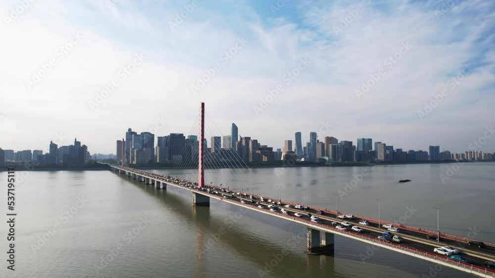 busy traffic on suspension bridge over qiantang river in hangzhou busy traffic on suspension bridge over qiantang river in hangzhou