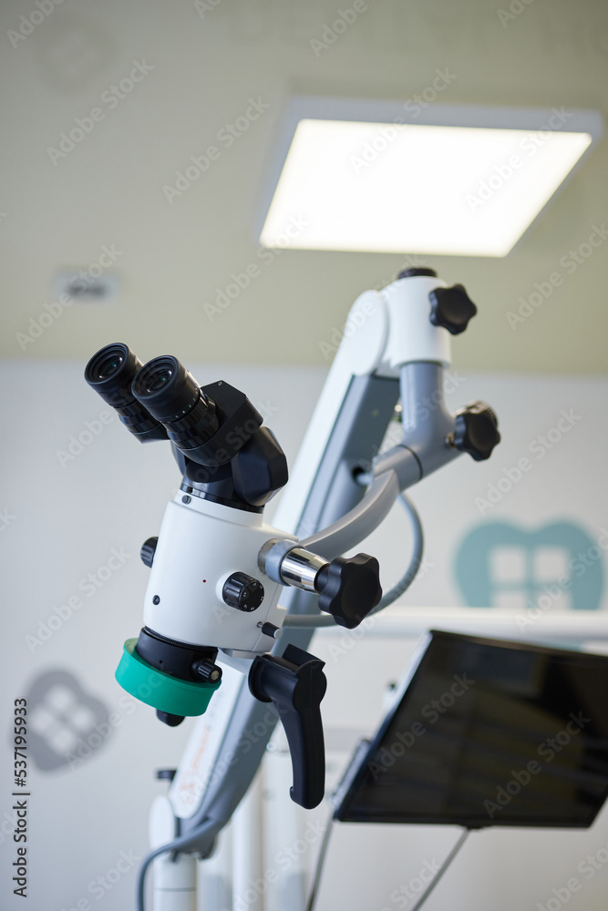 Modern microscope for operations in dental surgery room in stomatology clinic.