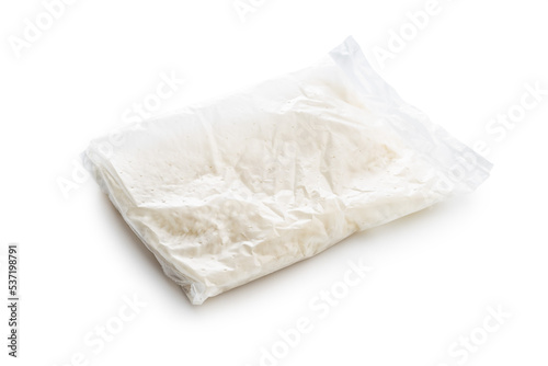 Uncooked rice in cooking sack isolated on white background.