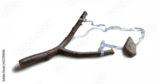 Slingshot and stones on a white background