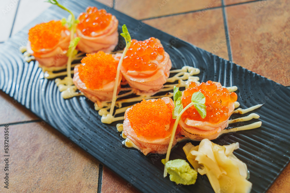 Japanese cuisine : Salmon rolls with tobiko and salmonkun Japanese cuisine : Salmon rolls with tobiko and salmonkun