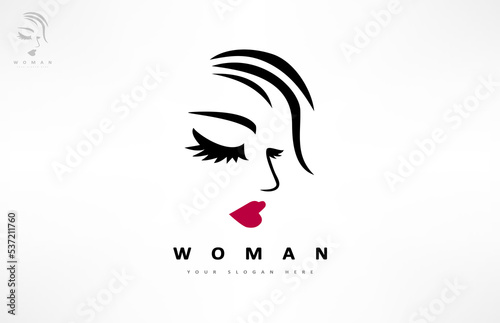 Woman face and hair logo. Beauty saloon design. 