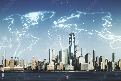 Double exposure of abstract digital world map on New York city skyscrapers background, research and strategy concept
