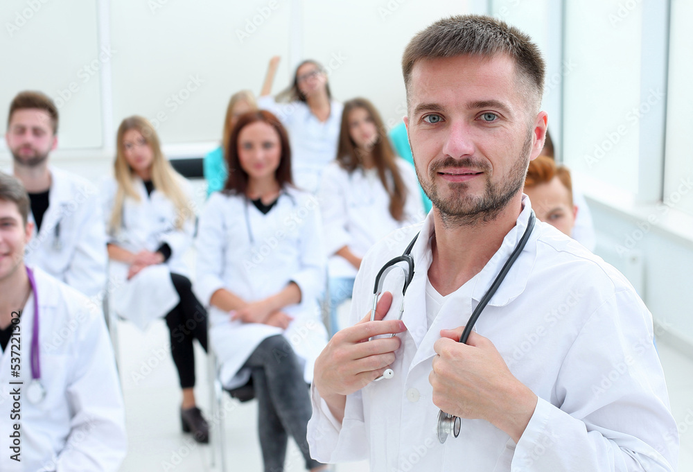 top view. a group of smiling doctors pointing at you. top view. a group of smiling doctors pointing at you.