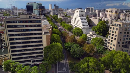 Skyscraper skyline Tranquil aerial view flight pedestal up drone
of Nollendorf Place Berlin Germany at summer day 2022. 4k marnitz Cinematic photo