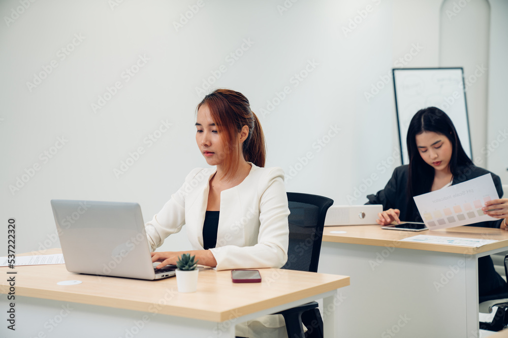 Successful businesspeople working at office desk, Concept of business risk analysis and assessment Successful businesspeople working at office desk, Concept of business risk analysis and assessment