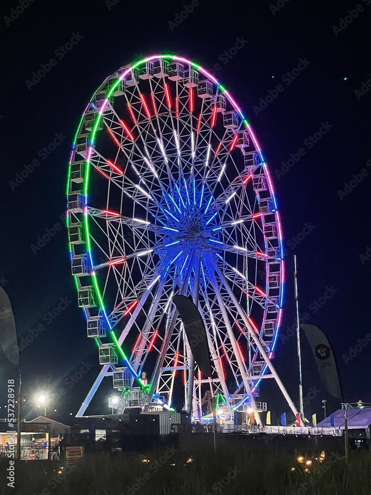 Colorful Ferris wheel with night lights Atlantic City New Jersey