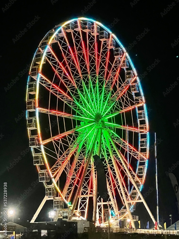 Colorful Ferris wheel with night lights Atlantic City New Jersey