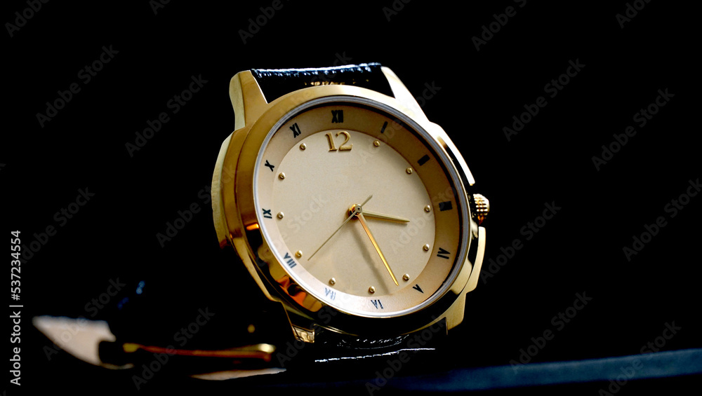 Luxury Men's Wrist Watch on a black background.Time concept Luxury Men's Wrist Watch on a black background.Time concept