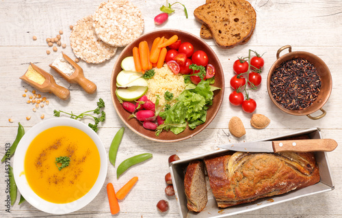 assorted of vegan dishes ( buddha bowl, soup, bread, vegan bread cake)