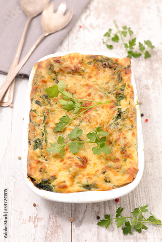 vegetarian gratin with vegetable,  cream and cheese