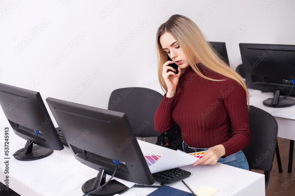 Portrait Of Happy Young Businesswoman woman near on white wall. Portrait Of Happy Young Businesswoman woman near on white wall.