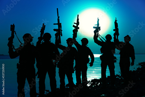 Army soldiers with rifles moon night silhouette