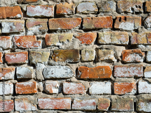 Old brick wall destroyed by time