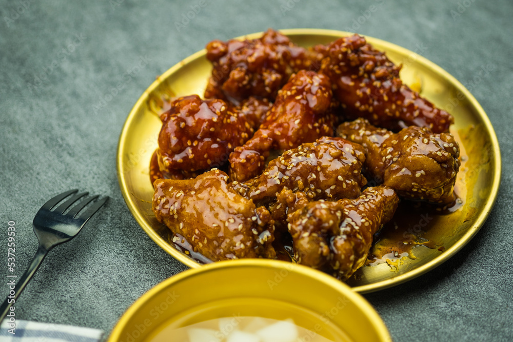 Fried chicken wings with sweet sauce and spicy sauce. Korean style. Fried chicken wings with sweet sauce and spicy sauce. Korean style.