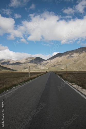 Italy, Umbria: The road that leads to Castelluccio.