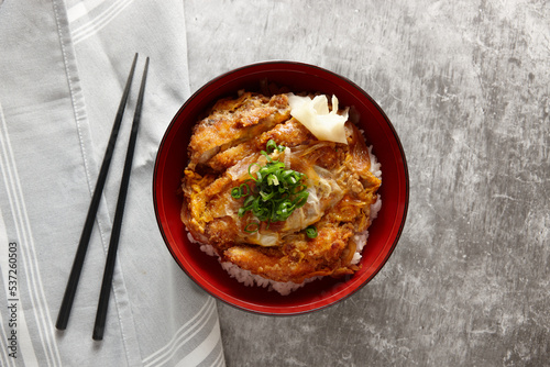 Katsu don dish on table photo