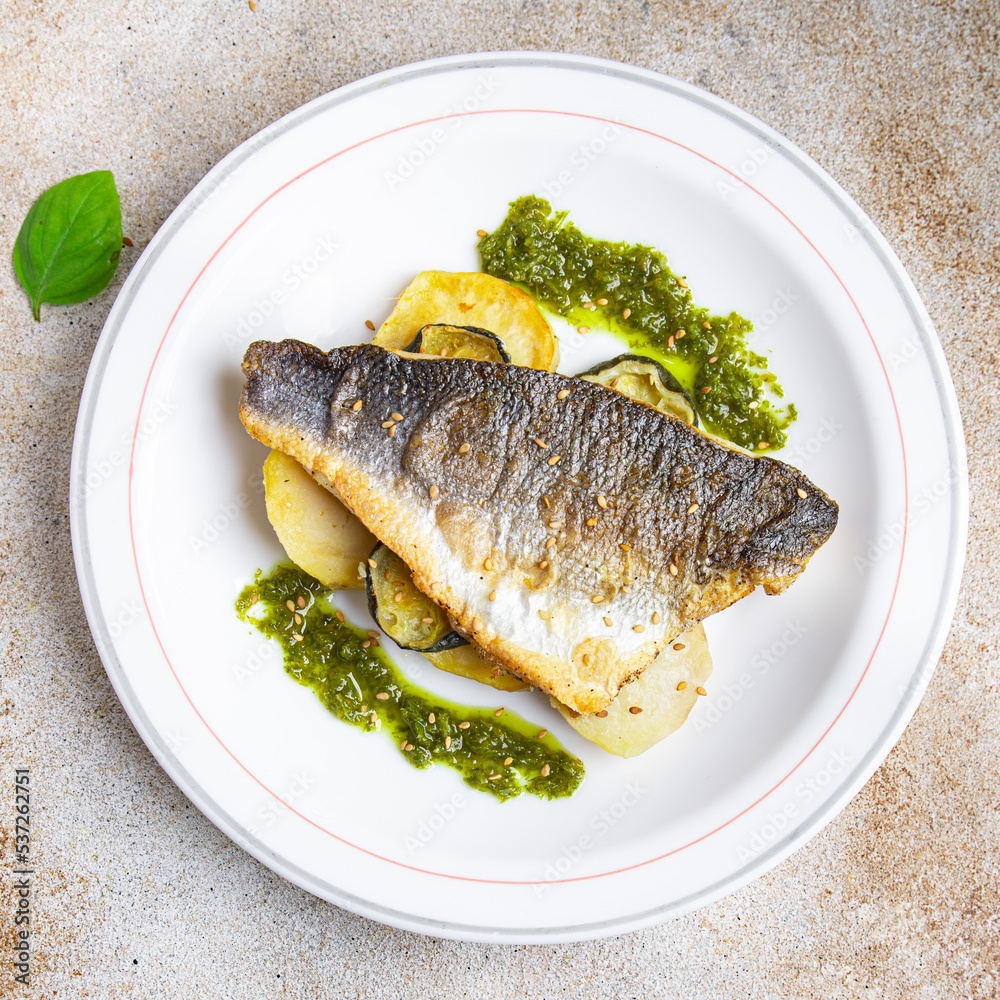 fish sea bass fried, vegetable and seafood meal food snack on the table copy space food background fish sea bass fried, vegetable and seafood meal food snack on the table copy space food background