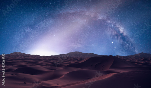 Fototapeta Naklejka Na Ścianę i Meble -  Amazing milky way over the sand dunes of Sahara Desert at sunset - Sahara, Morocco