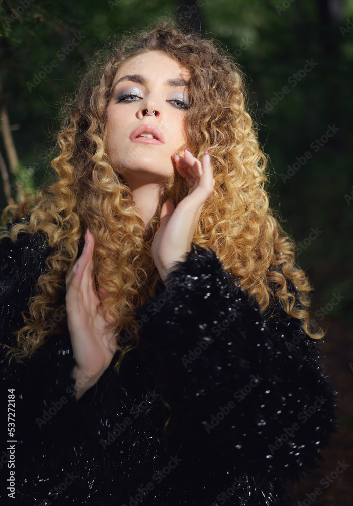 Portrait of young beautiful woman. Natural light. Shallow depth of field. Portrait of young beautiful woman. Natural light. Shallow depth of field.