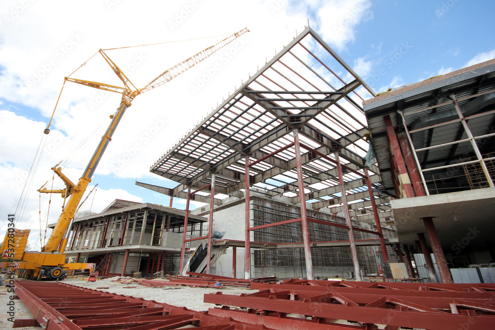 Steel frame of a new factory building under construction Steel frame of a new factory building under construction