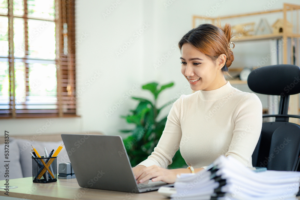 Asian women working in the office, young Asian business women as business executives, founding and running start-up executives, young female business leaders. Startup business concept. Asian women working in the office, young Asian business women as business executives, founding and running start-up executives, young female business leaders. Startup business concept.