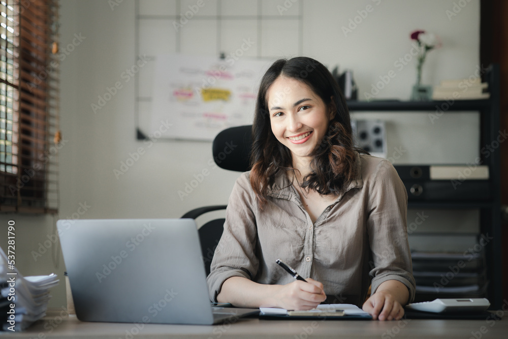 Asian women working in the office, young Asian business women as business executives, founding and running start-up executives, young female business leaders. Startup business concept. Asian women working in the office, young Asian business women as business executives, founding and running start-up executives, young female business leaders. Startup business concept.
