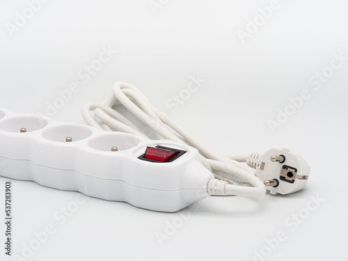 Electrical extension cord on a white background, power board