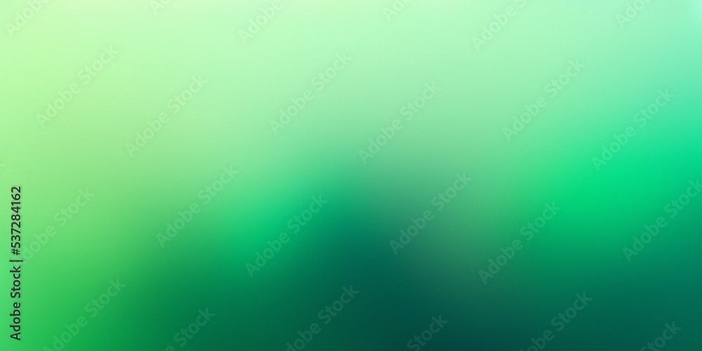 Green hues in a blurry, gradient backdrop