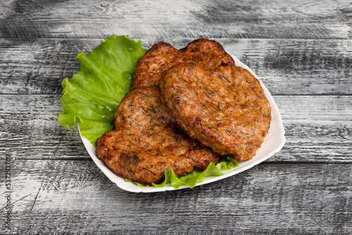 Cutlets, homemade cutlets on a wooden white background