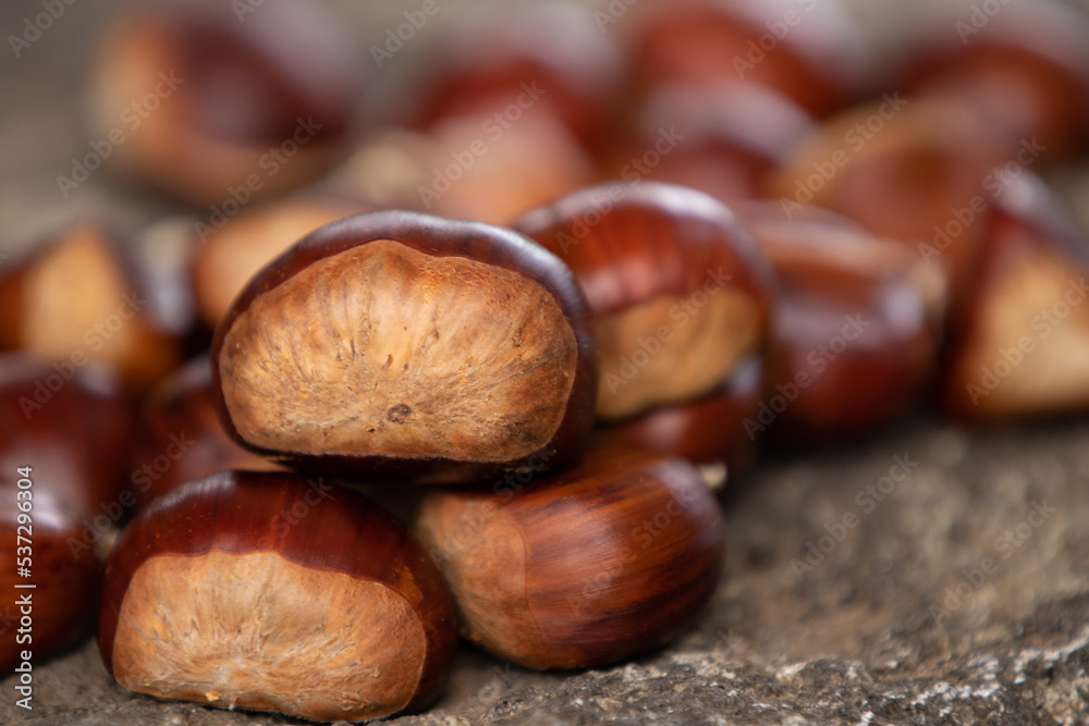 natural chestnuts stacked outdoors, autumn natural chestnuts stacked outdoors, autumn