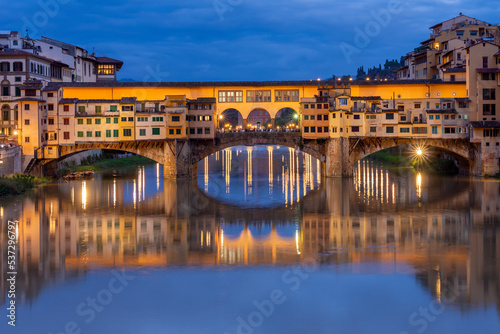 Ponte Vecchio bridge over Arno river at night, Florence, Italy