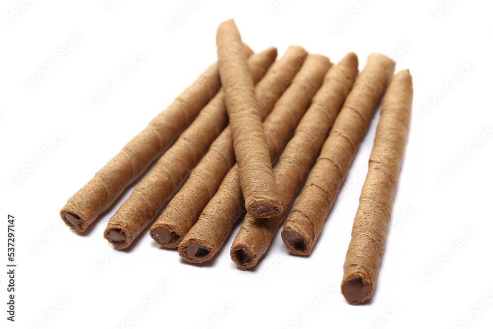 Waffle chocolate sticks with of cream black chocolate and orange, isolated on white
