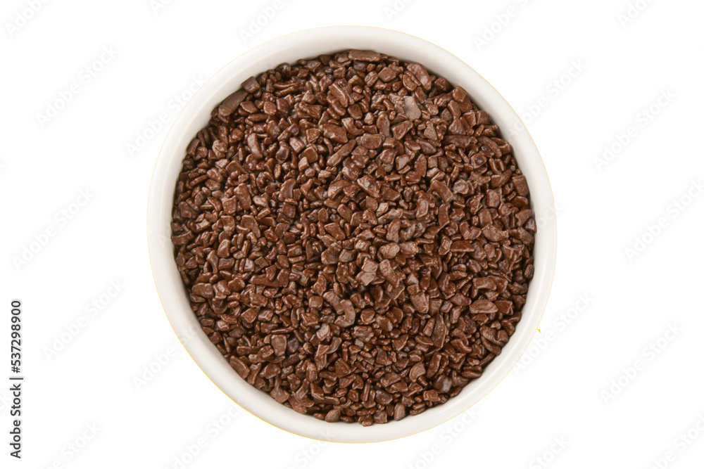 Chocolate sprinkles in white bowl top view Chocolate sprinkles in white bowl top view