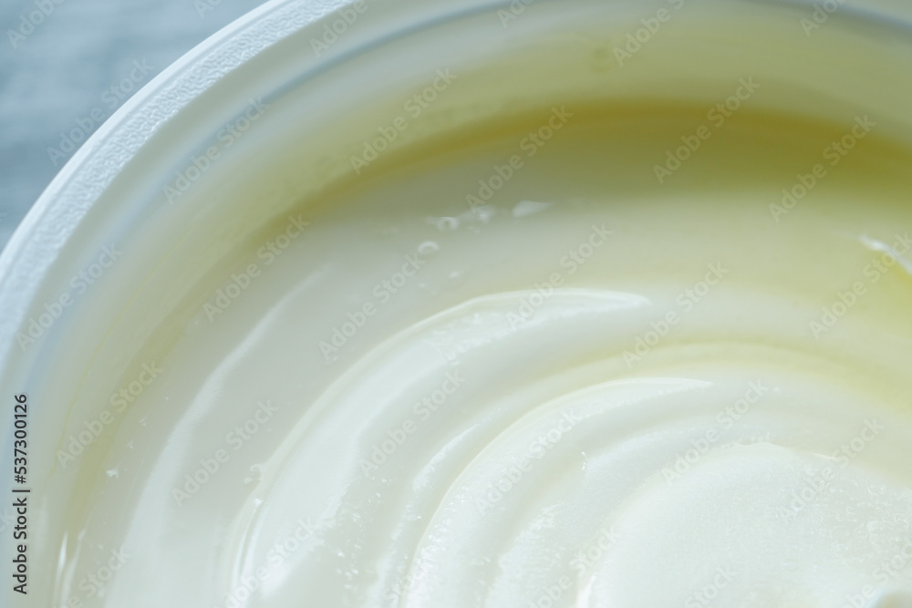 close up of fresh butter in a container close up of fresh butter in a container