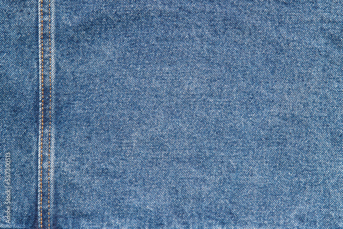 texture of blue jeans denim fabric with seam background	 photo