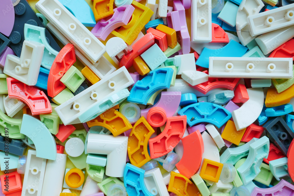 Fototapeta premium colorful building blocks on wooden table , top view