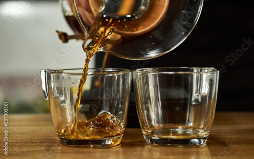 Coffee brew on a glass cup