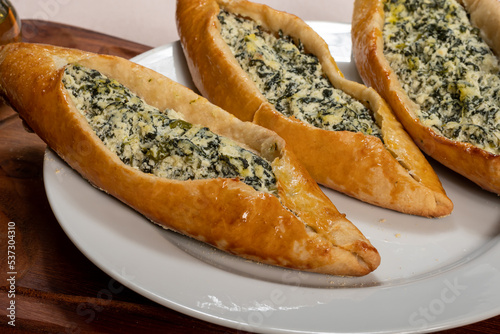 Turkish sfiha, stuffed with ricotta cheese and spinach