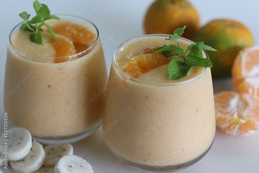 Fotografie Orange banana smoothie