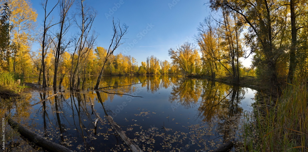 Russia. South of Western Siberia, Kuzbass. A windless sunny evening at the Pritomsky quarries of Novokuznetsk in the middle of autumn.