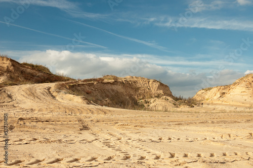 sand quarry, in the photo, a quarry for the extraction of sand against a blue sky