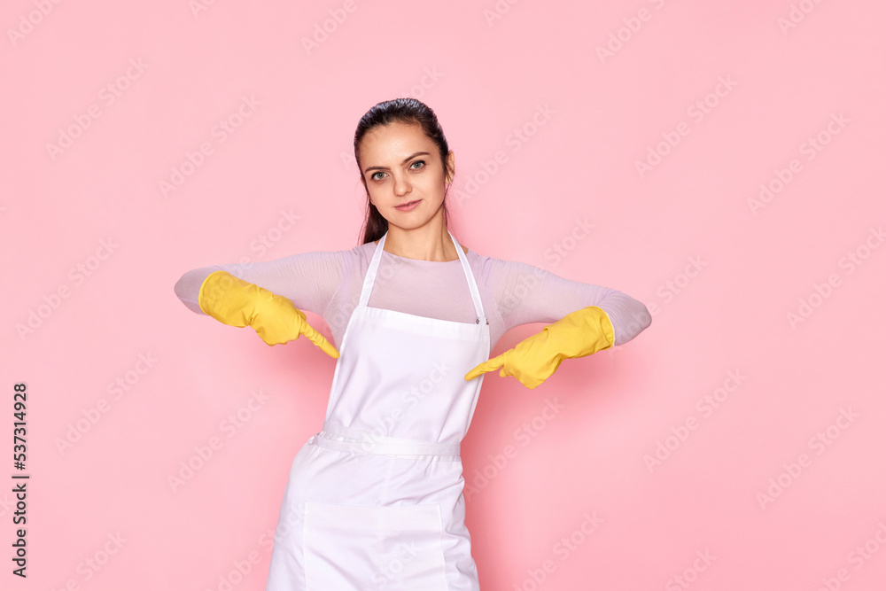 smiling caucasian woman in gloves pointing oneself with fingers smiling caucasian woman in gloves pointing oneself with fingers