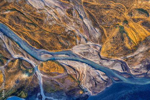 Abstract glacier rivers pattern flowing through volcanic lava field in Icelandic highlands