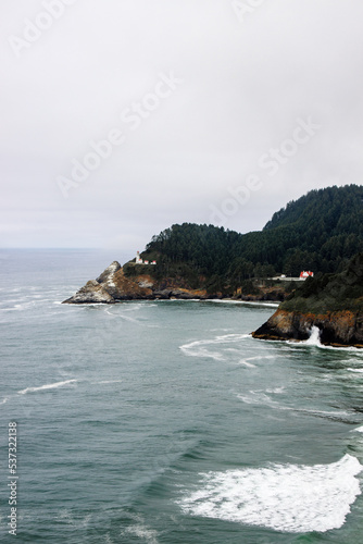 Scenic view of Heceta Head Lighthouse on the coastline of Oregon by historic route 101
