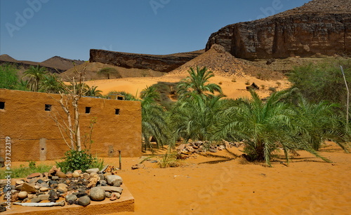 West Africa. Mauritania. Huts made of sand and stone in a village in the south of the Sahara Desert near the Terzhit oasis.
