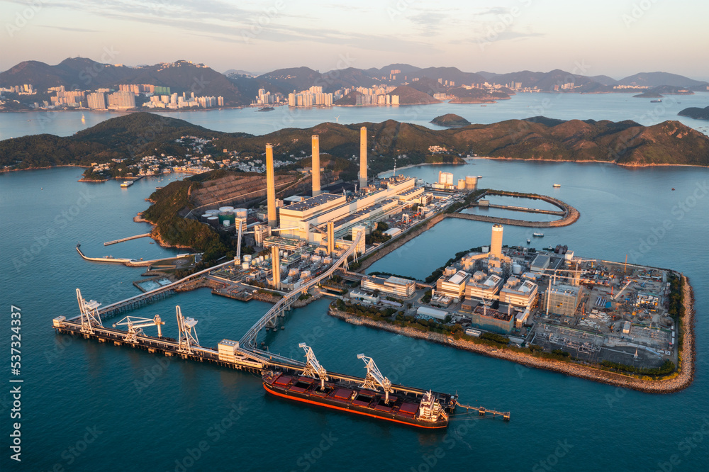 Aerial view of a coal fired power station at sunset in Lamma island of Hong Kong city