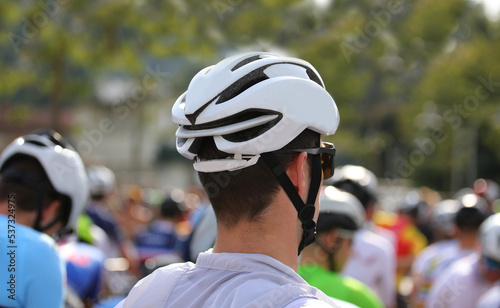 cyclist with protective helmet at the start of a cycling race © ChiccoDodiFC