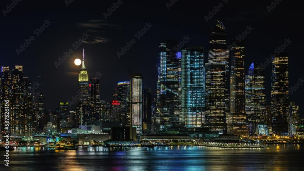 Night Timelapse Full-moon Rising over Midtown Manhattan New York Night Timelapse Full-moon Rising over Midtown Manhattan New York
